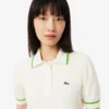 Damen-Poloshirt aus nahtloser 3D-Stretch-Baumwolle in verkürzter Passform