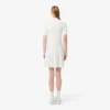 Damenkleid mit Plissee und Poloshirt-Kragen