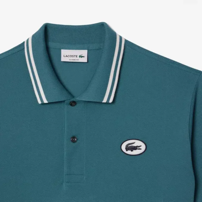 Herren-Poloshirt L.12.12 mit Badge in klassischer Passform