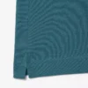 Herren-Poloshirt L.12.12 mit Badge in klassischer Passform