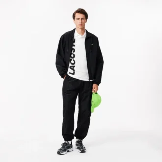 Herren-Poloshirt mit Regular Fit und „Lacoste Movement“-Print