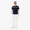 Herren-Tennis-Heritage-Poloshirt mit Ultra Dry-Emblem Herren-Tennis-Heritage-Poloshirt mit Ultra Dry-Emblem