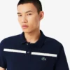 Herren-Tennis-Heritage-Poloshirt mit Ultra Dry-Emblem Herren-Tennis-Heritage-Poloshirt mit Ultra Dry-Emblem
