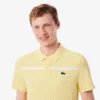 Herren-Tennis-Heritage-Poloshirt mit Ultra Dry-Emblem Herren-Tennis-Heritage-Poloshirt mit Ultra Dry-Emblem