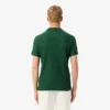 Herren-Tennis-Heritage-Poloshirt mit Ultra Dry-Emblem Herren-Tennis-Heritage-Poloshirt mit Ultra Dry-Emblem