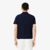 Herren-Tennis-Heritage-Poloshirt mit Ultra Dry-Emblem Herren-Tennis-Heritage-Poloshirt mit Ultra Dry-Emblem