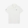 Herren-Tennis-Heritage-Poloshirt mit Ultra Dry-Emblem Herren-Tennis-Heritage-Poloshirt mit Ultra Dry-Emblem