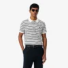 Klassisch geschnittenes gestreiftes Petit Piqué-Poloshirt Klassisch geschnittenes gestreiftes Petit Piqué-Poloshirt