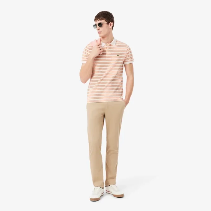 Klassisch geschnittenes gestreiftes Petit Piqué-Poloshirt Klassisch geschnittenes gestreiftes Petit Piqué-Poloshirt
