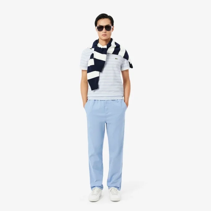 Klassisch geschnittenes gestreiftes Petit Piqué-Poloshirt Klassisch geschnittenes gestreiftes Petit Piqué-Poloshirt