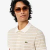 Klassisch geschnittenes gestreiftes Petit Piqué-Poloshirt Klassisch geschnittenes gestreiftes Petit Piqué-Poloshirt