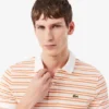 Klassisch geschnittenes gestreiftes Petit Piqué-Poloshirt Klassisch geschnittenes gestreiftes Petit Piqué-Poloshirt