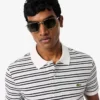 Klassisch geschnittenes gestreiftes Petit Piqué-Poloshirt Klassisch geschnittenes gestreiftes Petit Piqué-Poloshirt