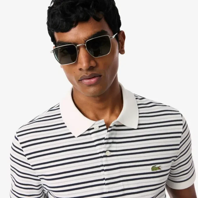 Klassisch geschnittenes gestreiftes Petit Piqué-Poloshirt Klassisch geschnittenes gestreiftes Petit Piqué-Poloshirt