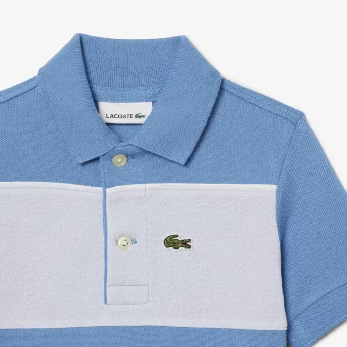 Petit Piqué Poloshirt mit Farbblock-Design