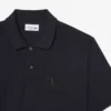 Petit-Piqué-Poloshirt mit Stickerei im klassischen Schnitt