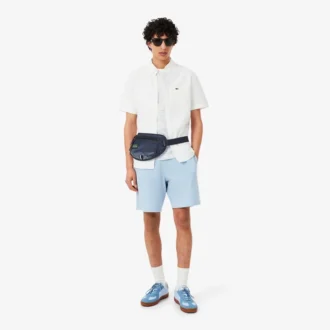 Play in Lacoste-Gürtel-Tasche