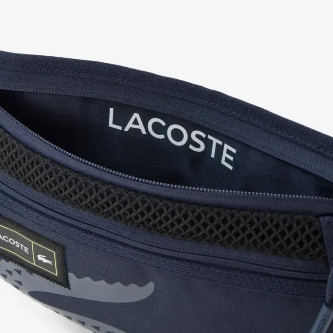 Play in Lacoste-Gürtel-Tasche