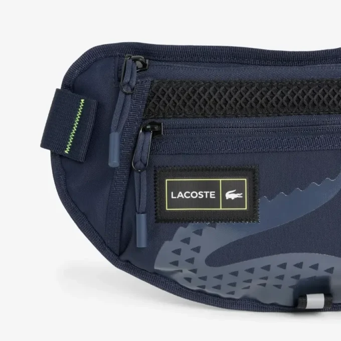 Play in Lacoste-Gürtel-Tasche