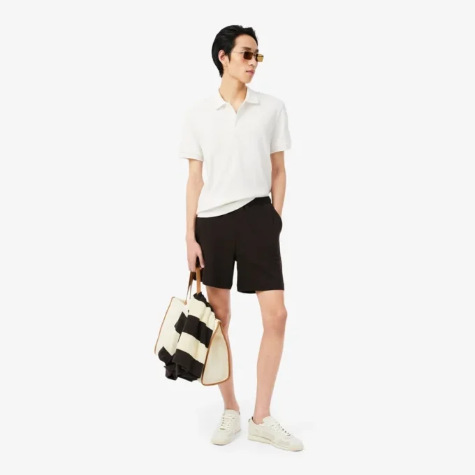 Polohemd mit klassischer Passform aus geripptem Strick