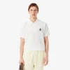 Polohemd mit klassischer Passform und Emblem-Akzent