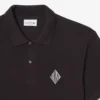 Polohemd mit klassischer Passform und Emblem-Akzent