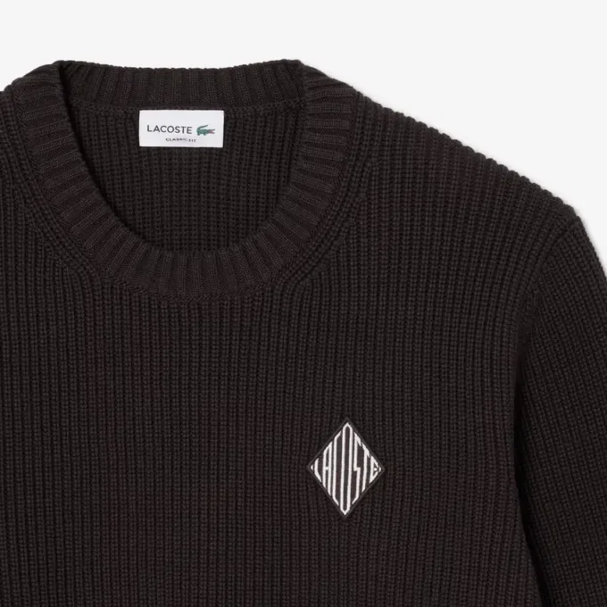 Pullover mit Perlen-Rippenstrick und Emblem