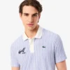 Thermoregulierendes gestreiftes Golf-Poloshirt für Herren