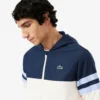 Wasserabweisende Herren-Tennisjacke mit Kapuze