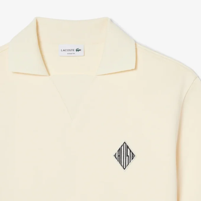 Weit geschnittenes Fleece-Poloshirt mit Emblem